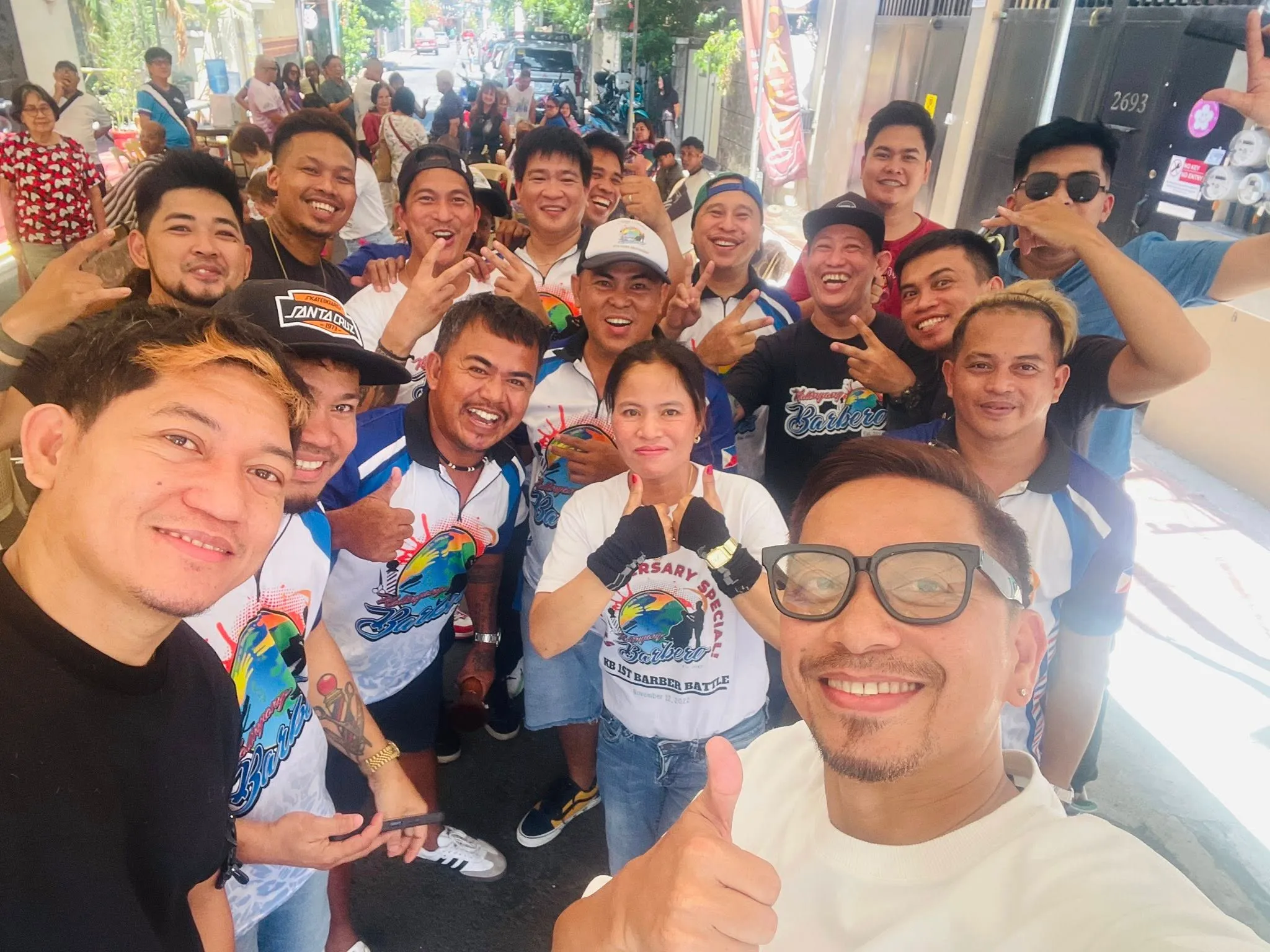 Jojo Mislang from Muy Guapito Barbers volunteering at a charity work led by Kalingang Barbero